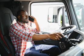 tow truck driver on call with customer